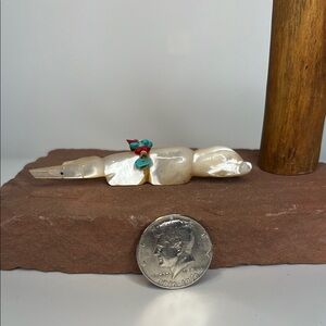 Elegant Mother of Pearl Beaver figurine.